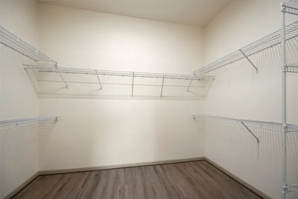 a view of a room with racks on the wall