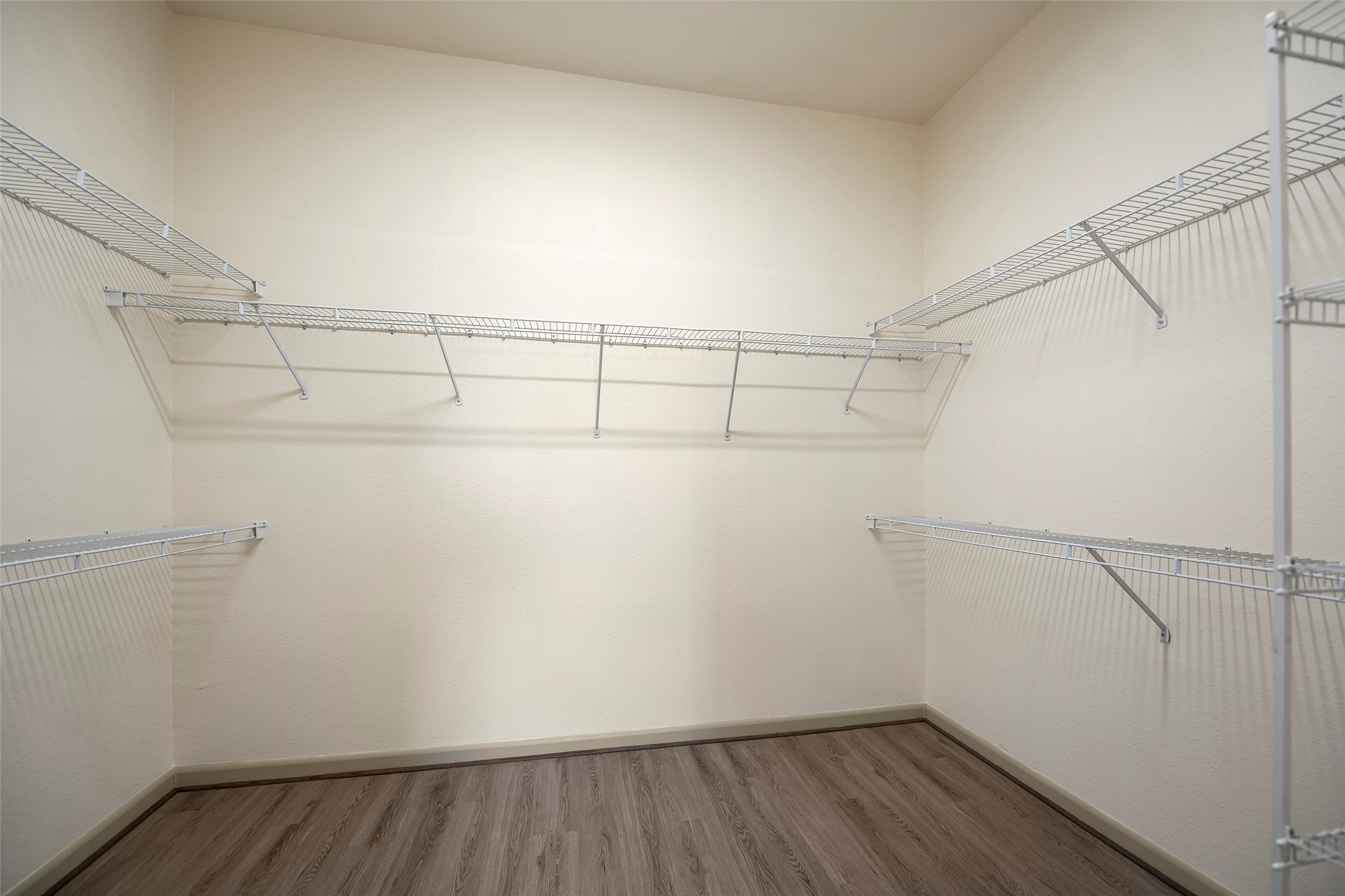 3505 Sage Road, Unit 314 Houston, TX 77056 - Photo 13 of 24 a view of a room with racks on the wall
