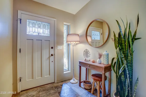 a view of a livingroom with furniture and wooden floor