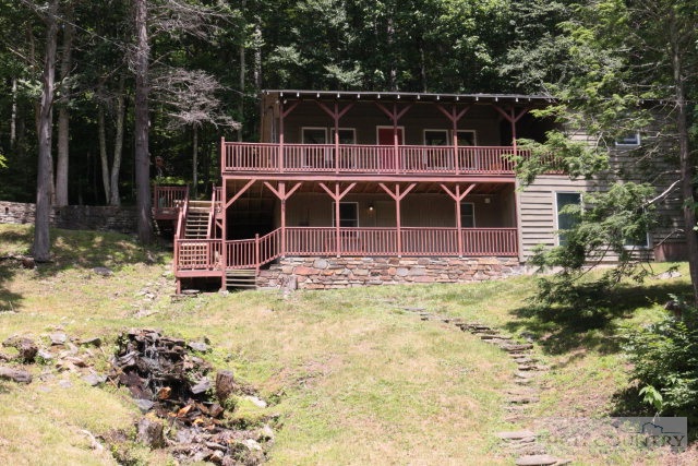 148 Grady Winkler Road Boone, NC 28607 - Photo 2 of 24 a view of a house with backyard and trees