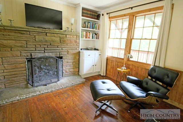 148 Grady Winkler Road Boone, NC 28607 - Photo 23 of 24 a living room with furniture and a flat screen tv