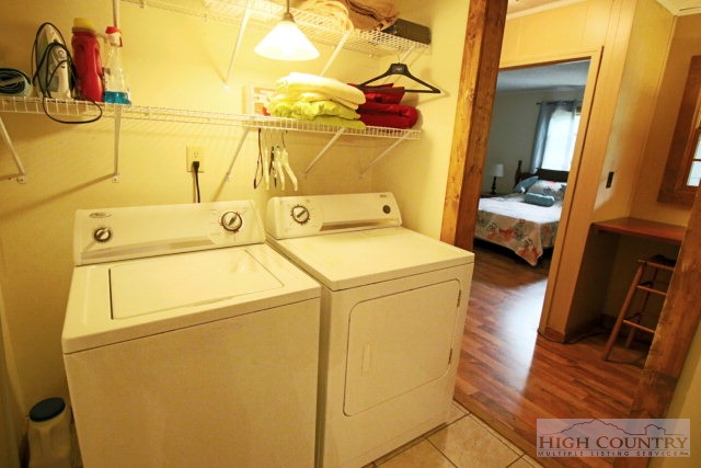148 Grady Winkler Road Boone, NC 28607 - Photo 8 of 24 a utility room with dryer and washer