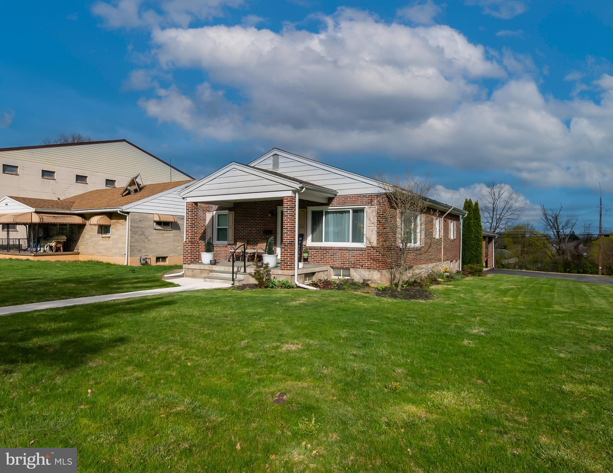 300 Old Fritztown Road Reading, PA 19607 - Photo 2 of 28 a front view of a house with a garden
