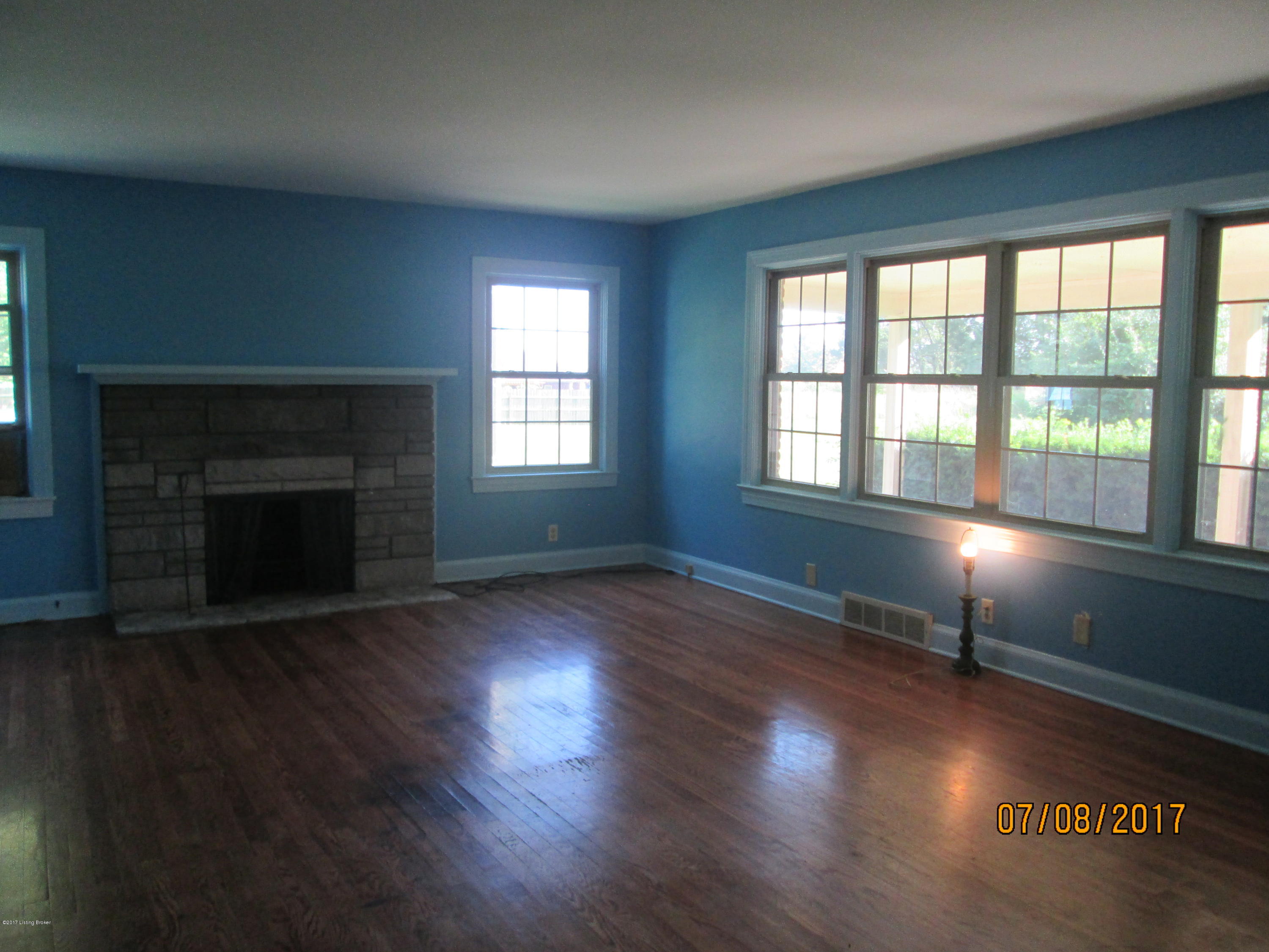 3649 Zoneton Road Shepherdsville, KY 40165 - Photo 12 of 28 Living Room with Fire Place and lots of windows