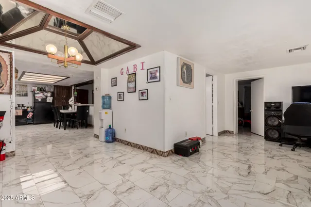 a view of a dining room with furniture