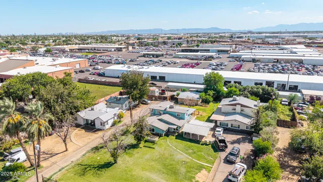 an aerial view of a house with a garden