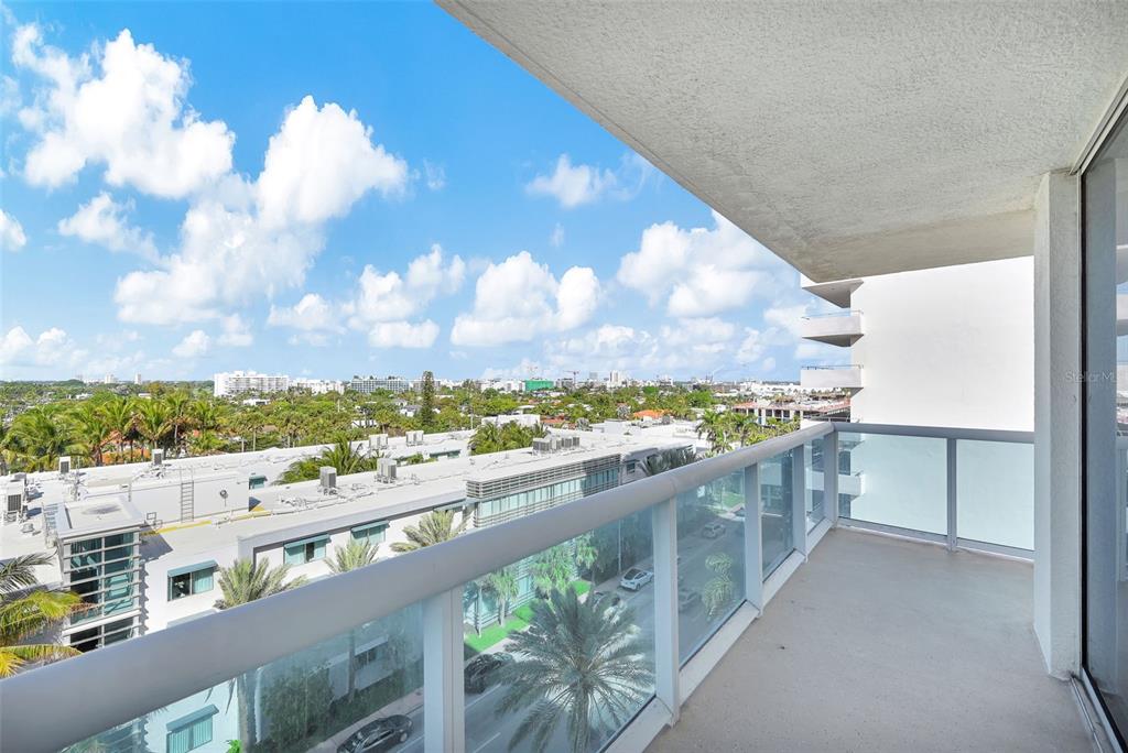 9201 Collins Avenue, Unit 821 Surfside, FL 33154 - Photo 14 of 60 a view of a city from a balcony
