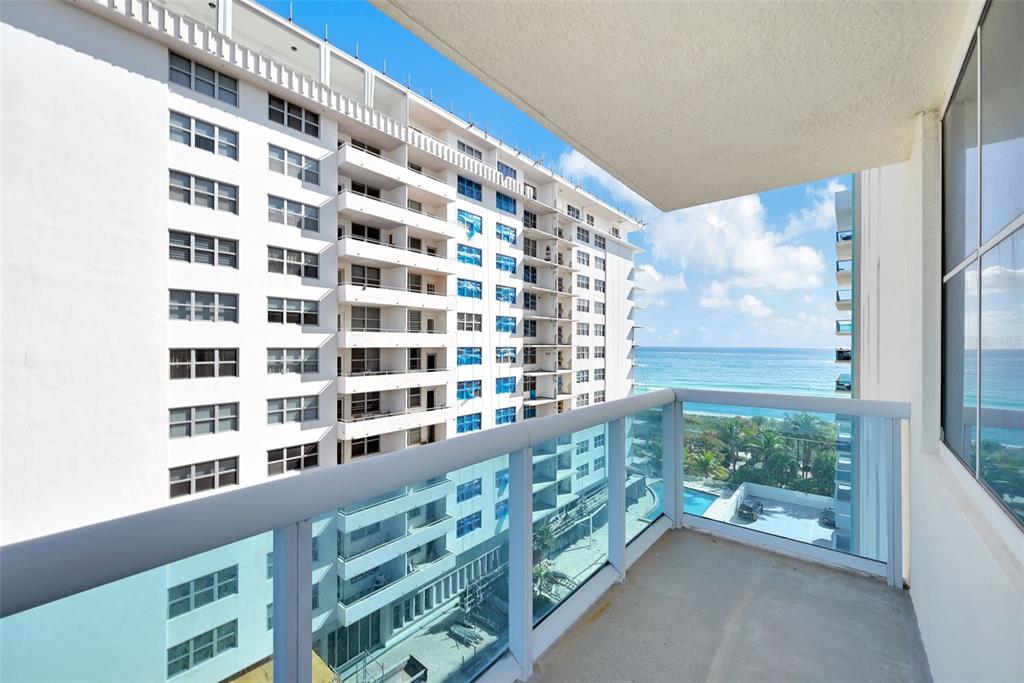 9201 Collins Avenue, Unit 821 Surfside, FL 33154 - Photo 20 of 60 a view of a building from a balcony