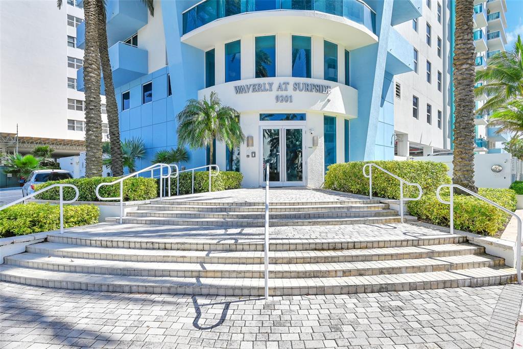 9201 Collins Avenue, Unit 821 Surfside, FL 33154 - Photo 32 of 60 a view of a building with a garden
