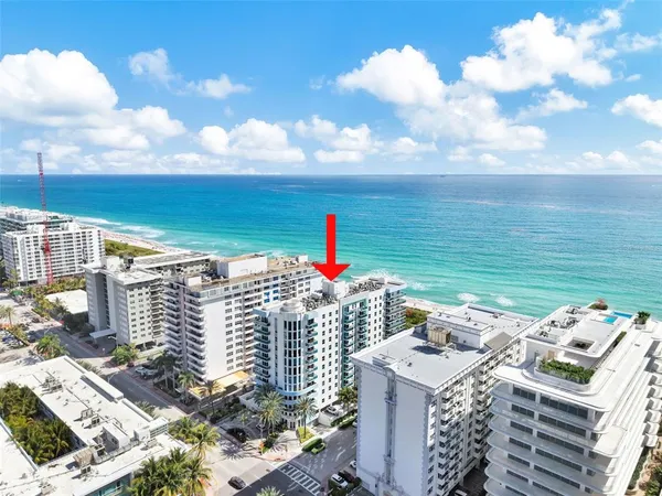 a view of a city with ocean