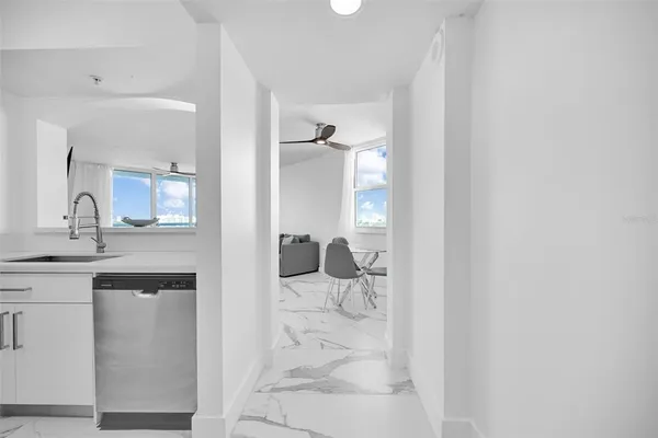 a view of kitchen and dining room with wooden floor