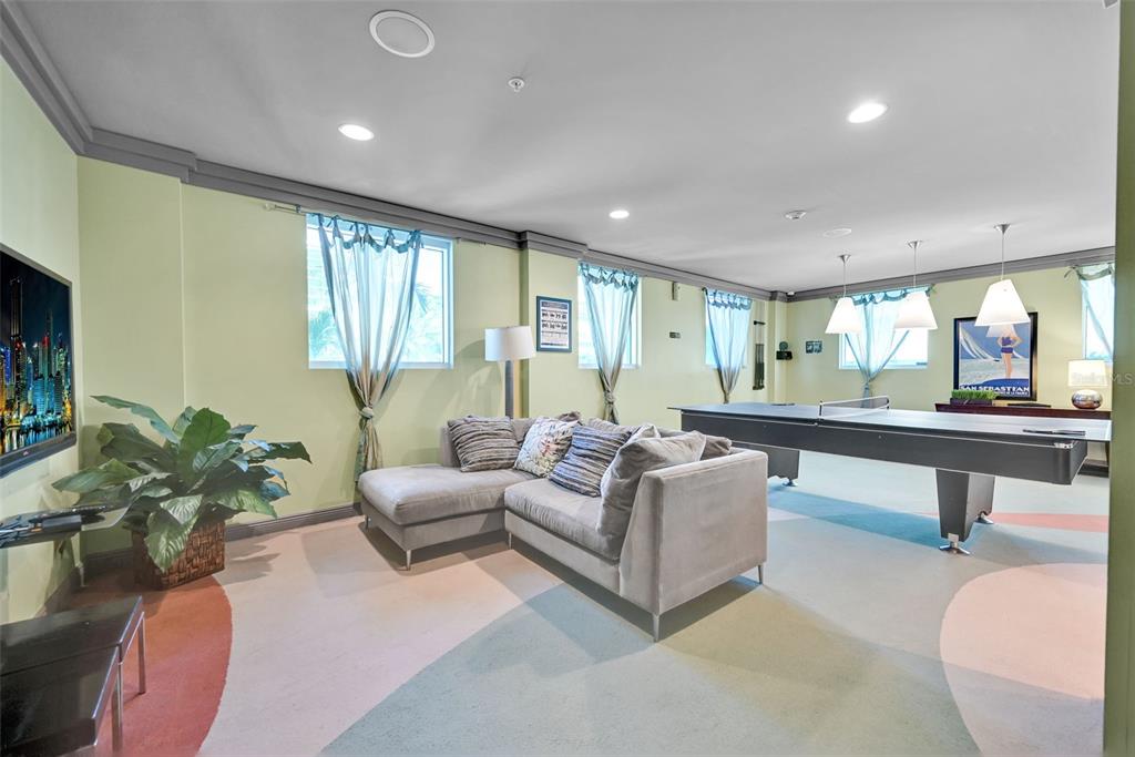 9201 Collins Avenue, Unit 821 Surfside, FL 33154 - Photo 59 of 60 a living room with furniture and a large window