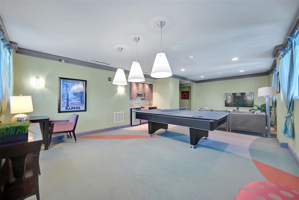 9201 Collins Avenue, Unit 821 Surfside, FL 33154 - Photo 60 of 60 a living room with furniture a window and a table