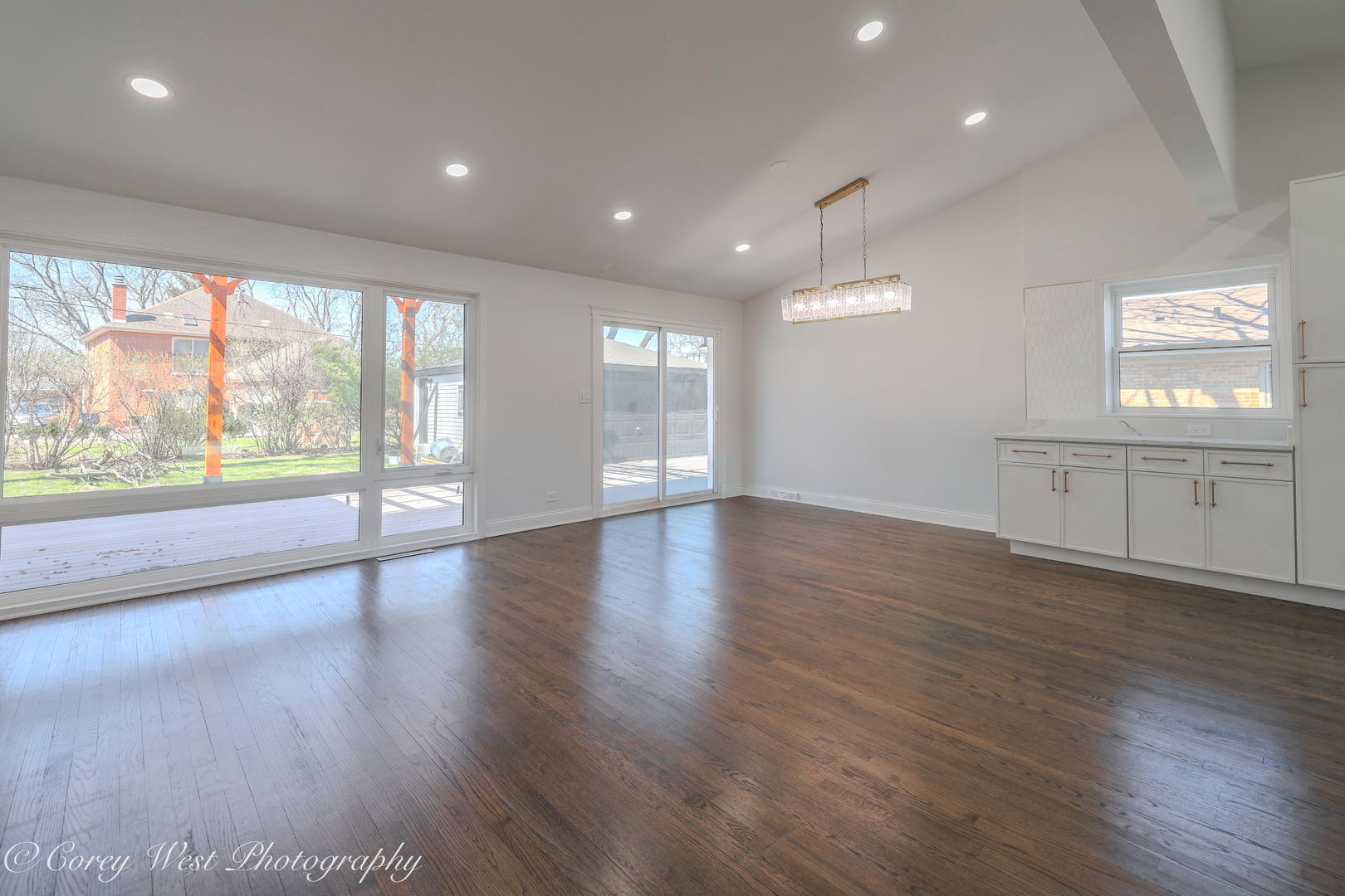 217 Heather Lane Wilmette, IL 60091 - Photo 15 of 44 an empty room with wooden floor and windows