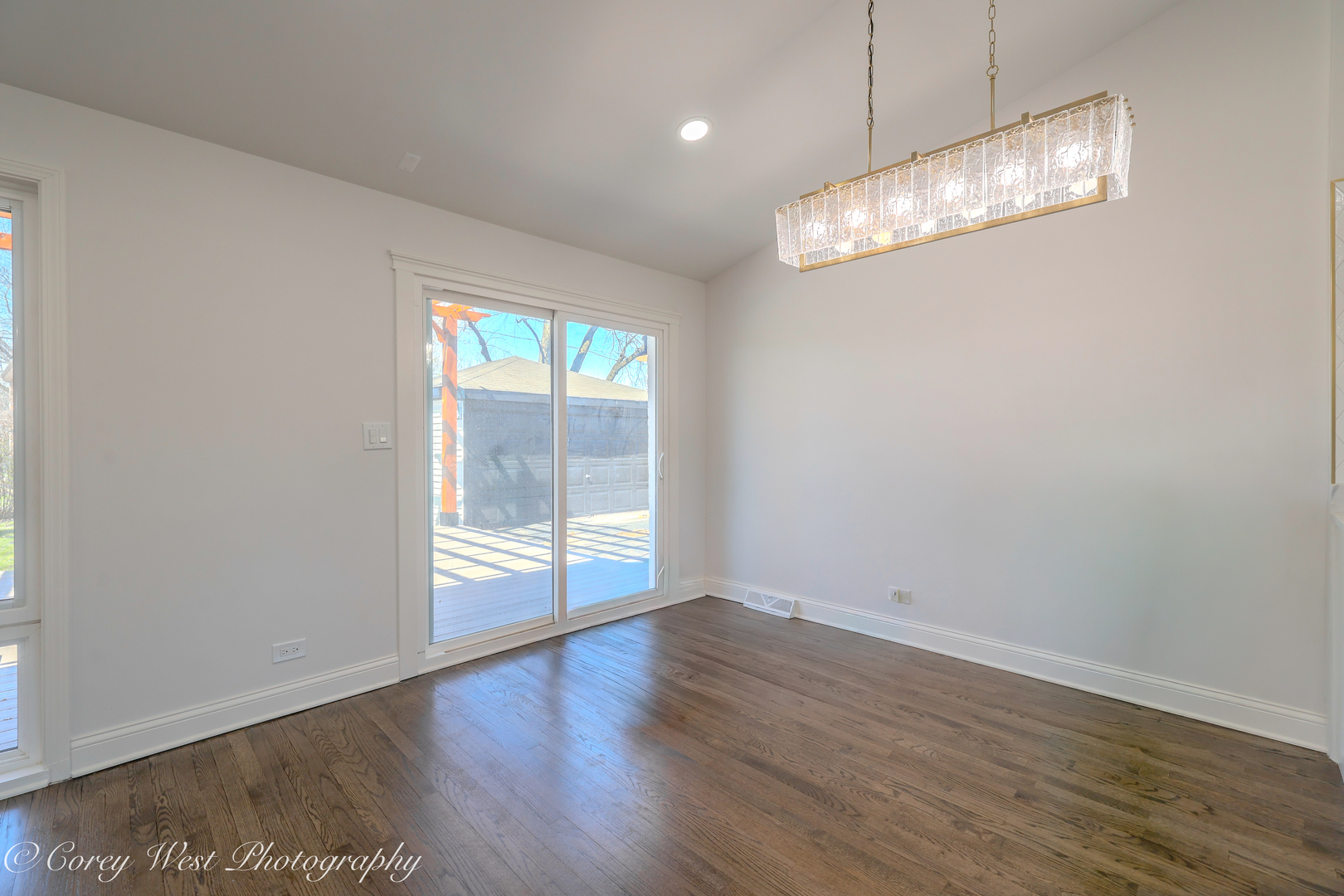 217 Heather Lane Wilmette, IL 60091 - Photo 16 of 44 an empty room with wooden floor and windows