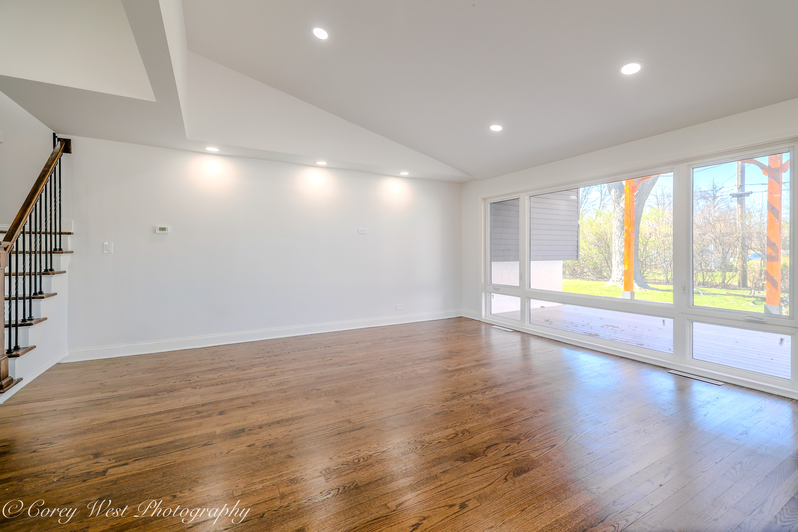217 Heather Lane Wilmette, IL 60091 - Photo 17 of 44 a view of empty room with wooden floor and fan
