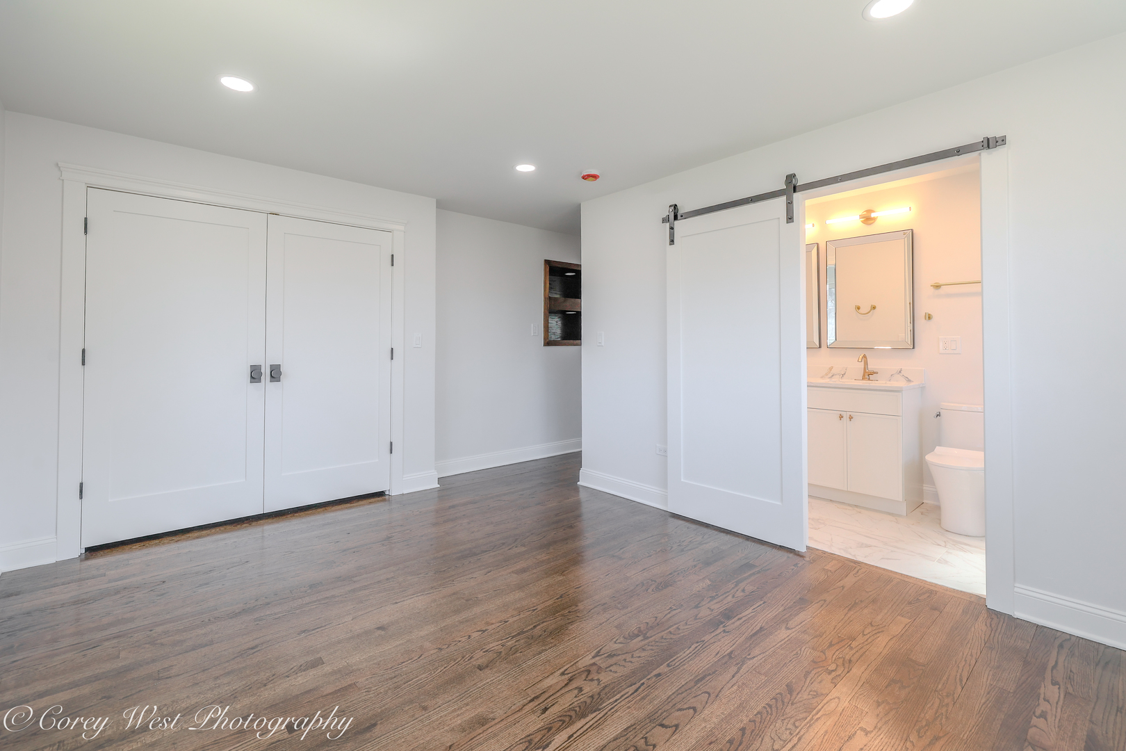 217 Heather Lane Wilmette, IL 60091 - Photo 26 of 44 a view of an empty room with wooden floor and a window