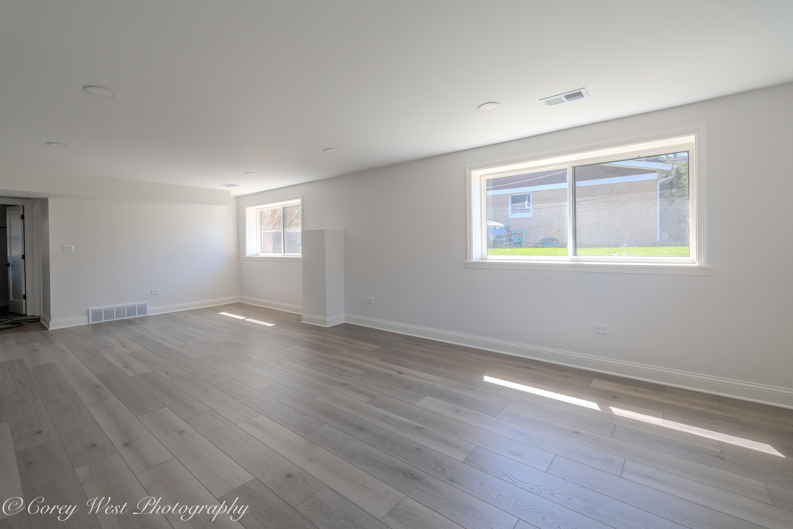 217 Heather Lane Wilmette, IL 60091 - Photo 34 of 44 an empty room with wooden floor and windows