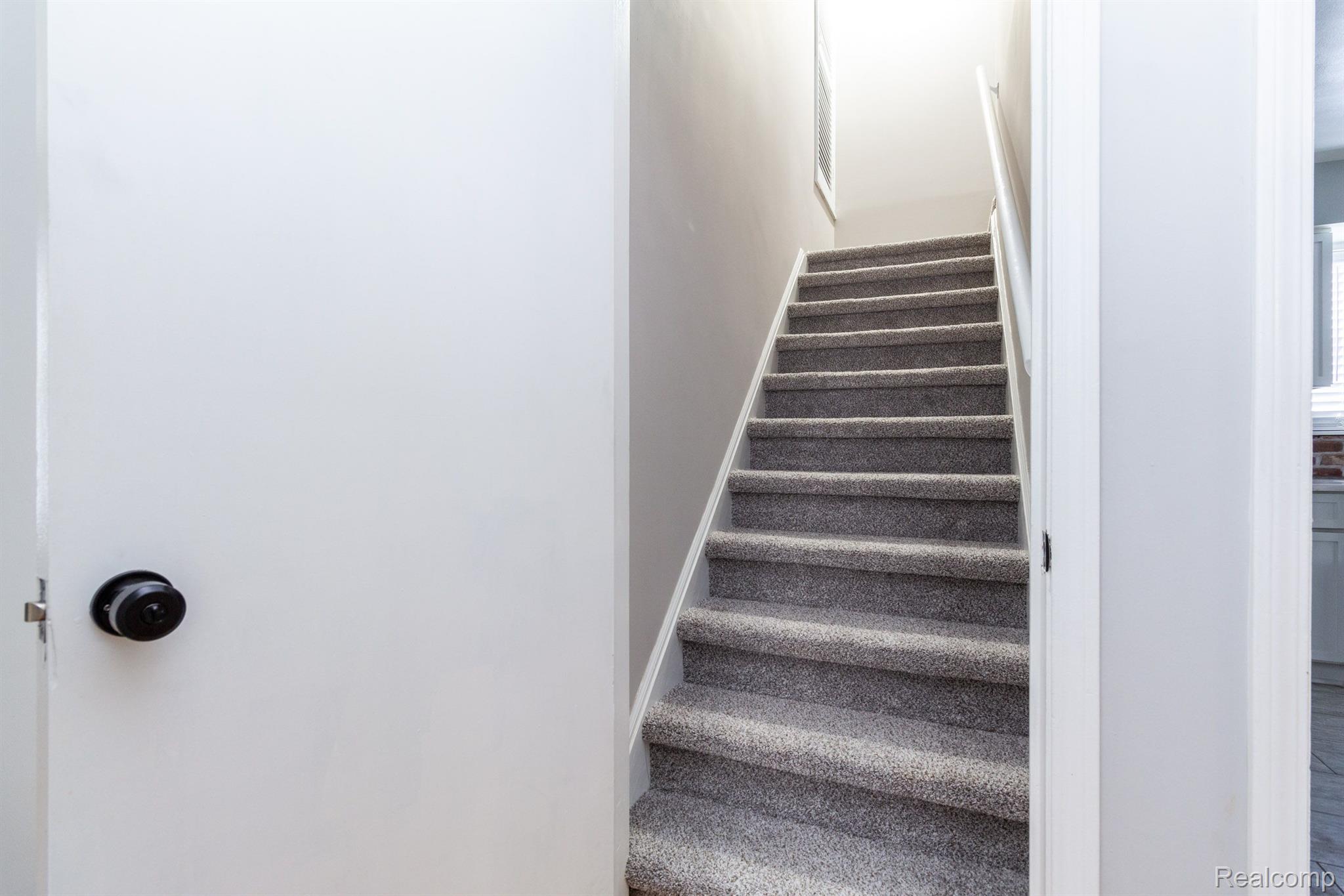 15239 Champaign Road Allen Park, MI 48101 - Photo 15 of 34 BRAND NEW NEUTRAL PLUSH CARPET ON STAIRS!