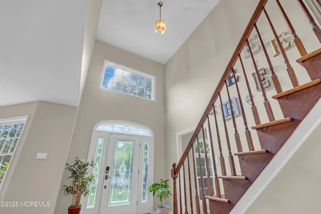 a living room with fireplace furniture and a flat screen tv
