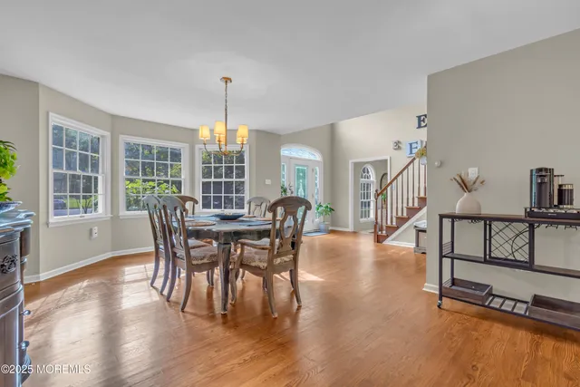 a living room with furniture fireplace and flat screen tv