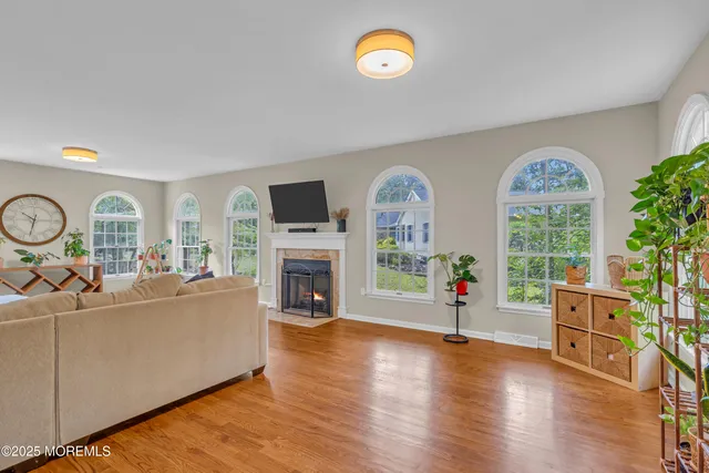 a view of a kitchen with furniture and an empty room