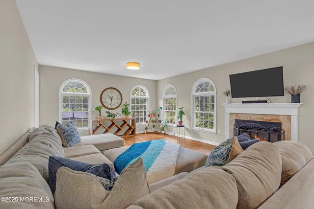 a view of a balcony with wooden floor