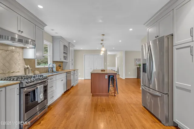 a view of a swimming pool with an outdoor space and seating area