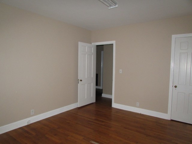 1730 Houston Lake Road Perry, GA 31069 - Photo 24 of 27 a view of an empty room with wooden floor