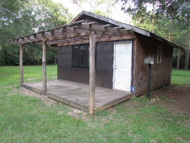 1730 Houston Lake Road Perry, GA 31069 - Photo 4 of 27 a view of a house with a yard