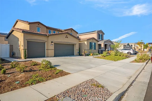 a front view of a house with a entertaining space