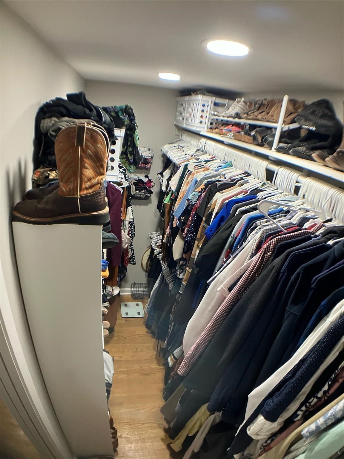 3027 Guese Road Houston, TX 77018 - Photo 13 of 22 Walk-in closet provides generous storage space with built-in shelving and room for organization.