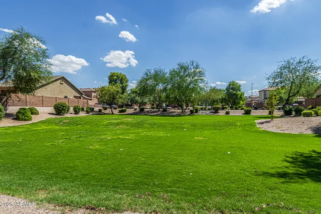 a kitchen with stainless steel appliances granite countertop a sink and stove