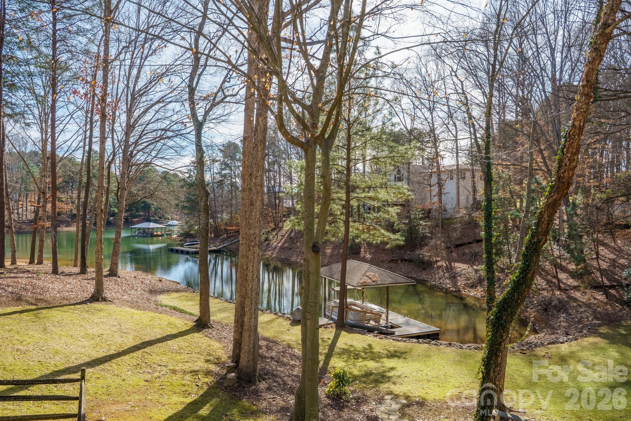 301 Agnew Road Mooresville, NC 28117 - Photo 15 of 42 a lake view with large trees