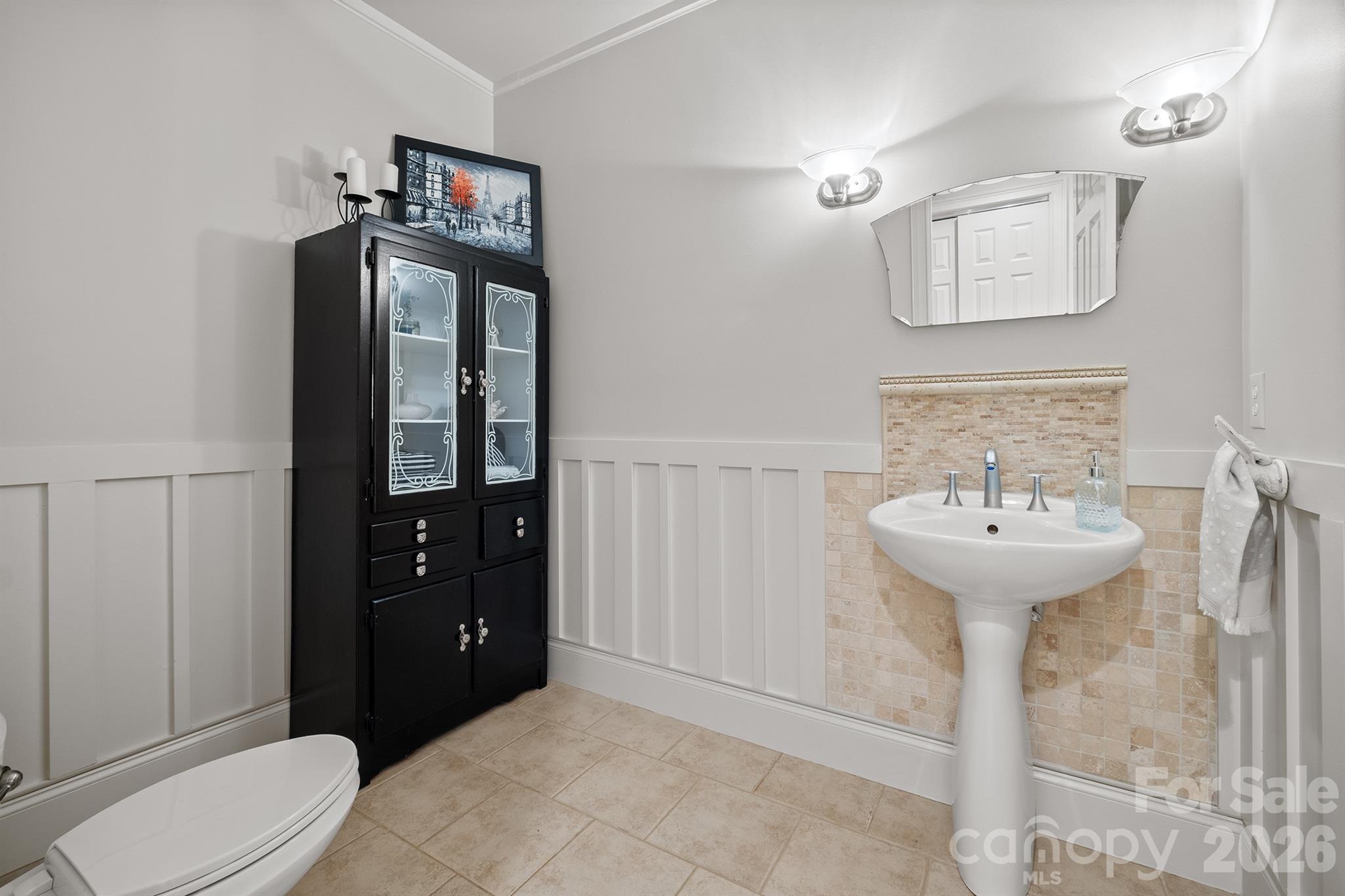 301 Agnew Road Mooresville, NC 28117 - Photo 17 of 42 a bathroom with a sink a toilet and mirror