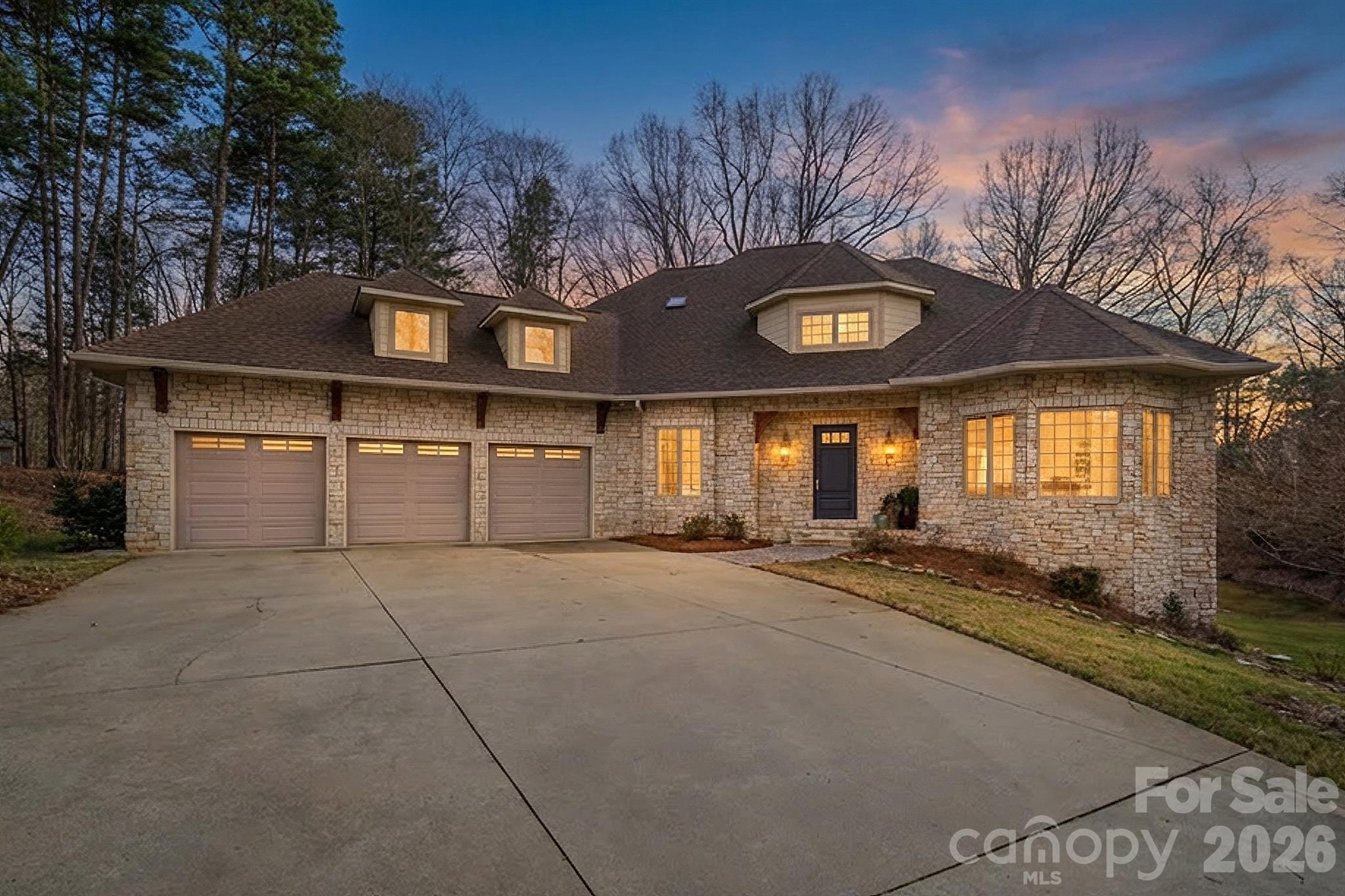 301 Agnew Road Mooresville, NC 28117 - Photo 2 of 42 a front view of a house with a garden