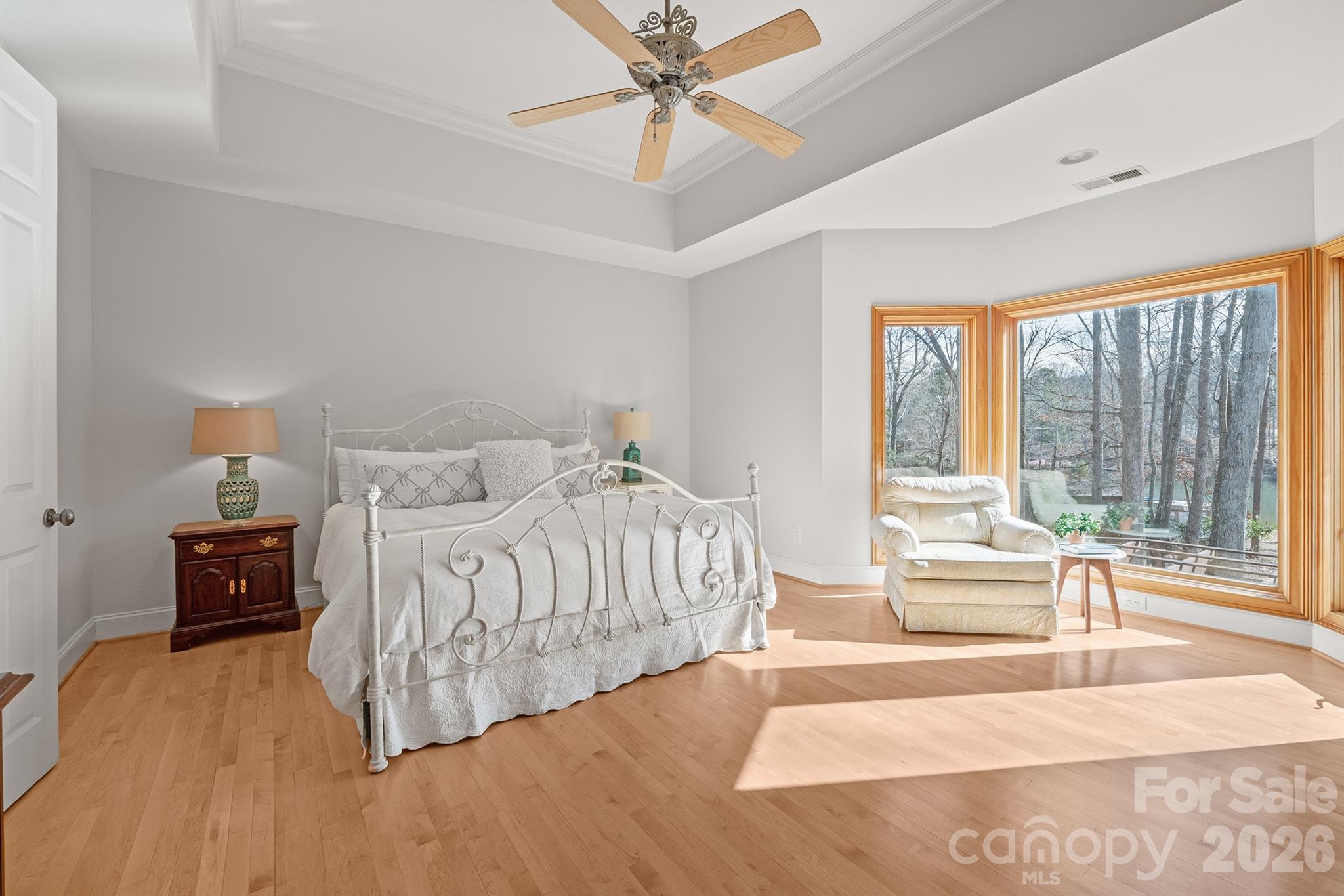 301 Agnew Road Mooresville, NC 28117 - Photo 30 of 42 a spacious bedroom with a bed and a large window