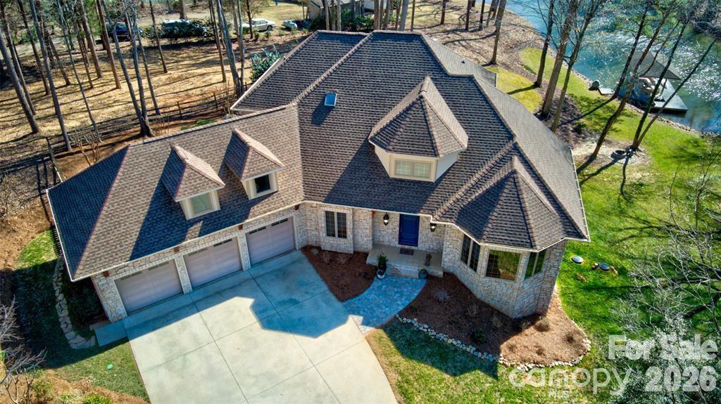 301 Agnew Road Mooresville, NC 28117 - Photo 3 of 42 a aerial view of a house with swimming pool