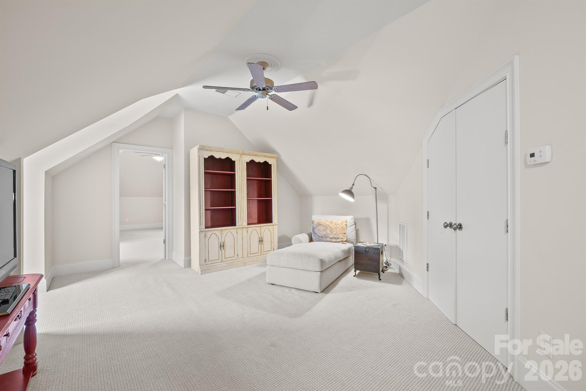 301 Agnew Road Mooresville, NC 28117 - Photo 36 of 42 a bedroom with a large bed and ceiling fan