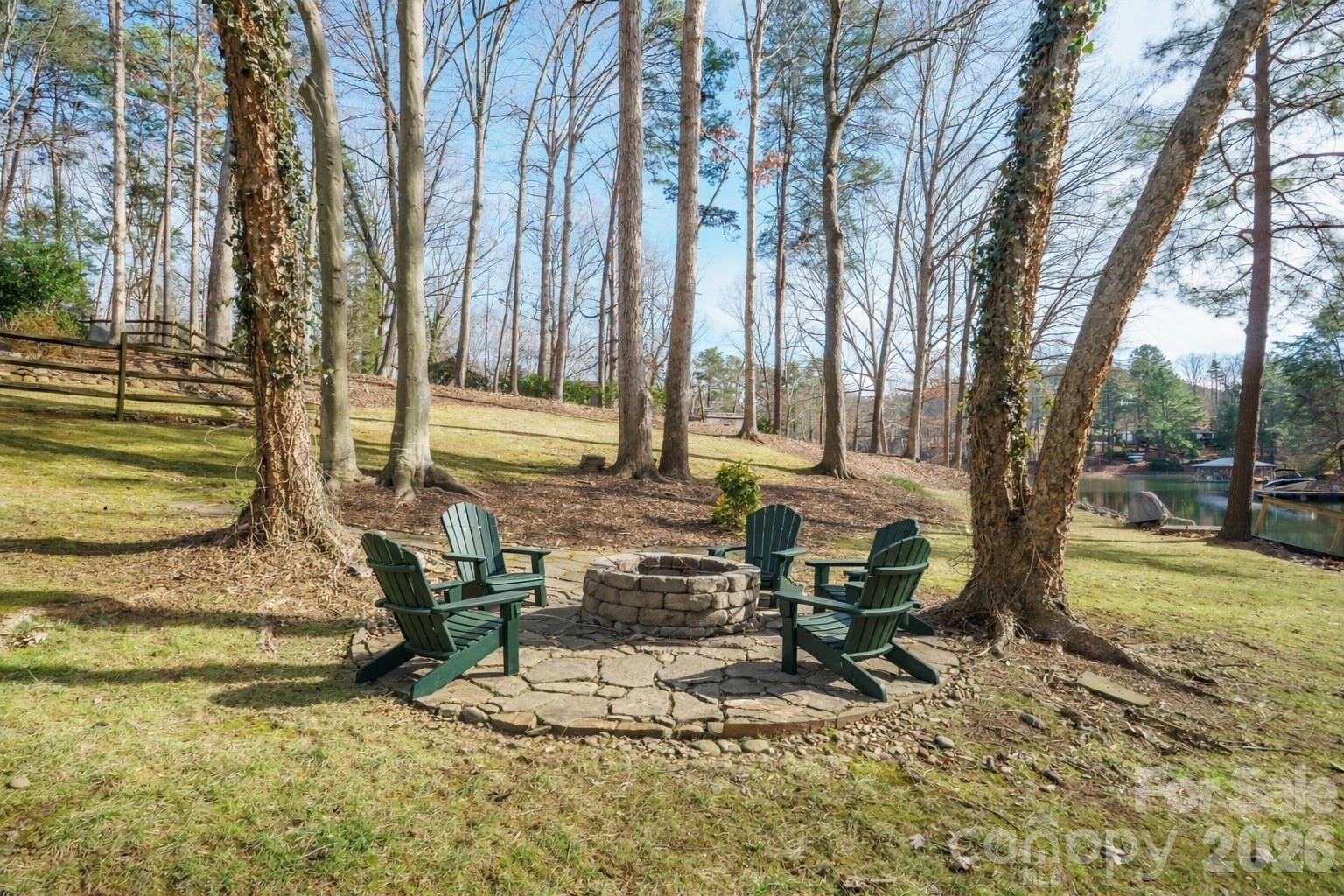 301 Agnew Road Mooresville, NC 28117 - Photo 40 of 42 a backyard of a house with table and chairs