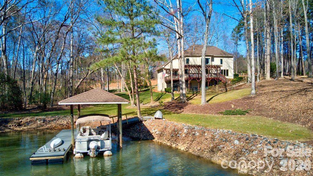 301 Agnew Road Mooresville, NC 28117 - Photo 42 of 42 an aerial view of a house with swimming pool patio and outdoor seating