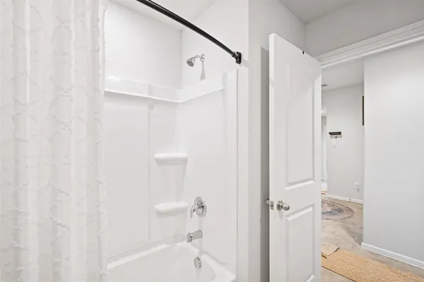 a bathroom with a toilet and a sink