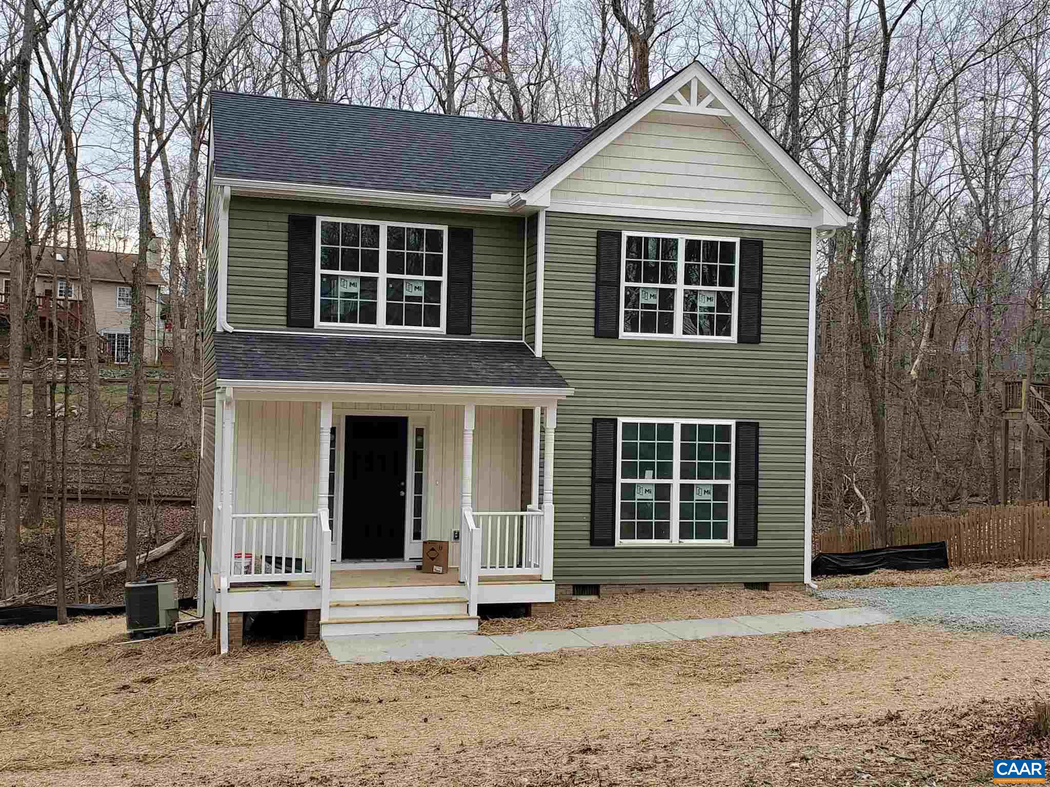 5 Zephyr Road, Unit LOT 268 Palmyra, VA 22963 - Photo 1 of 19 a front view of a house with a yard and garage