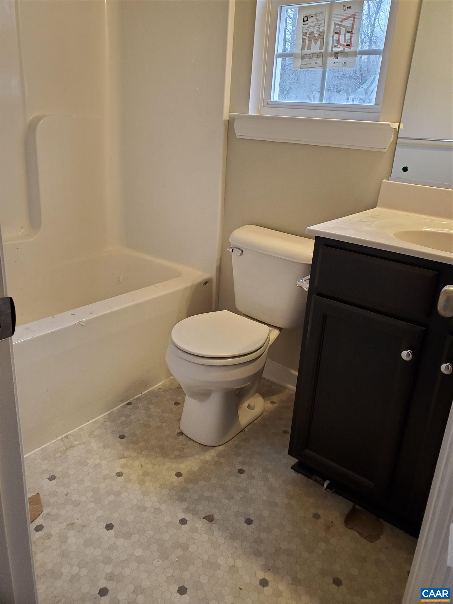 5 Zephyr Road, Unit LOT 268 Palmyra, VA 22963 - Photo 14 of 19 a bathroom with a toilet and a bathtub
