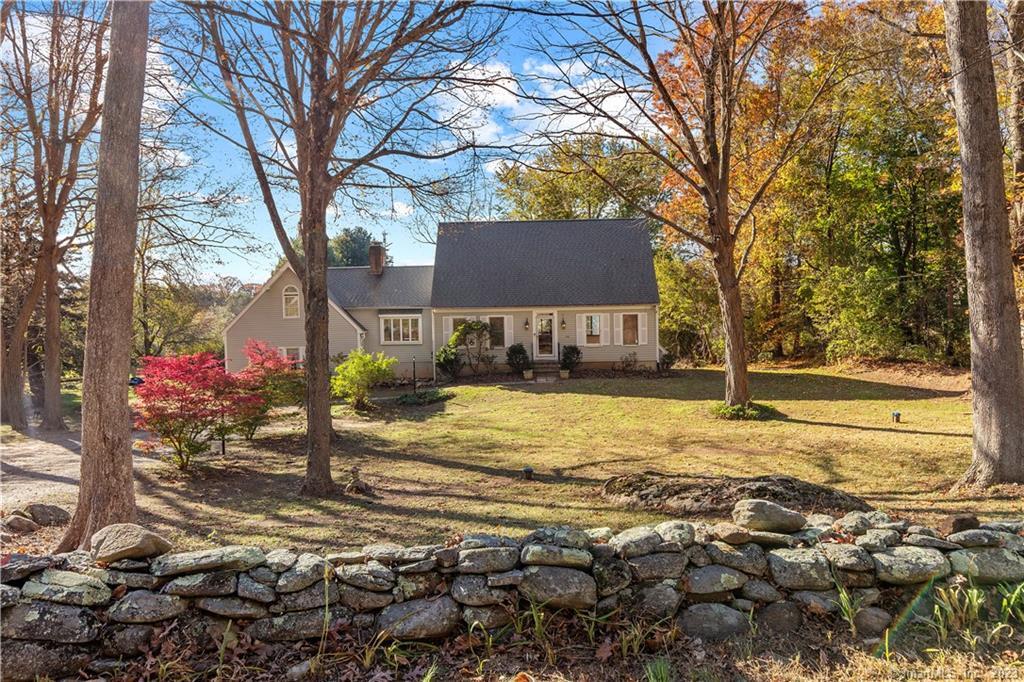 393 Copse Road Madison, CT 06443 - Photo 1 of 1 a view of a yard with a tree