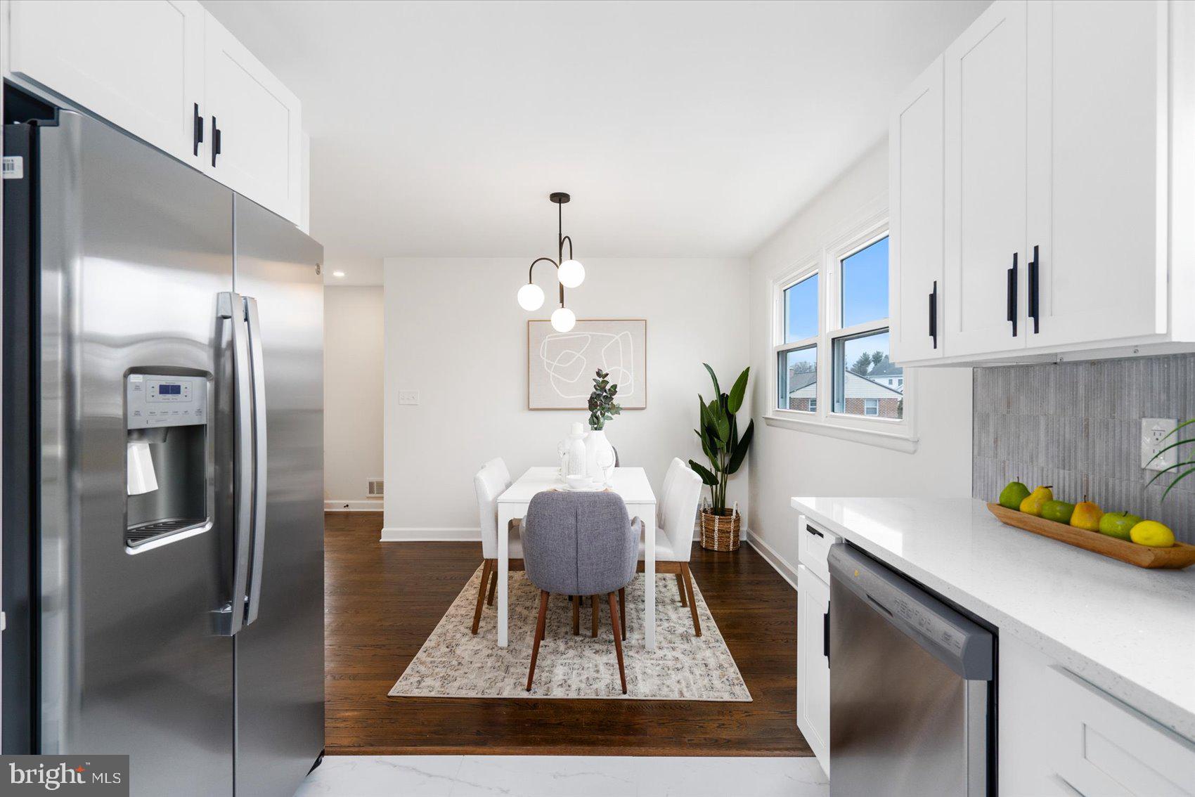 6809 Richardson Road Baltimore, MD 21207 - Photo 13 of 43 a living room with furniture and a table