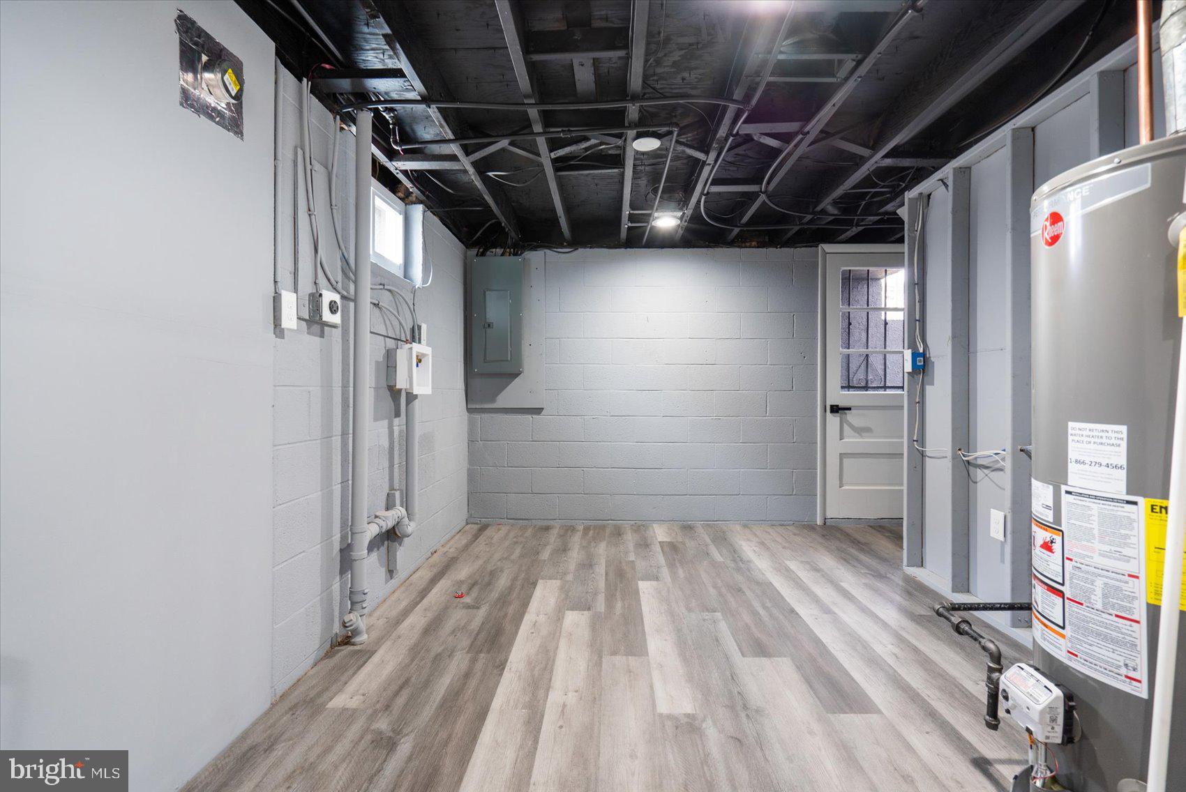 6809 Richardson Road Baltimore, MD 21207 - Photo 29 of 43 a view of storage and utility room with refrigerator
