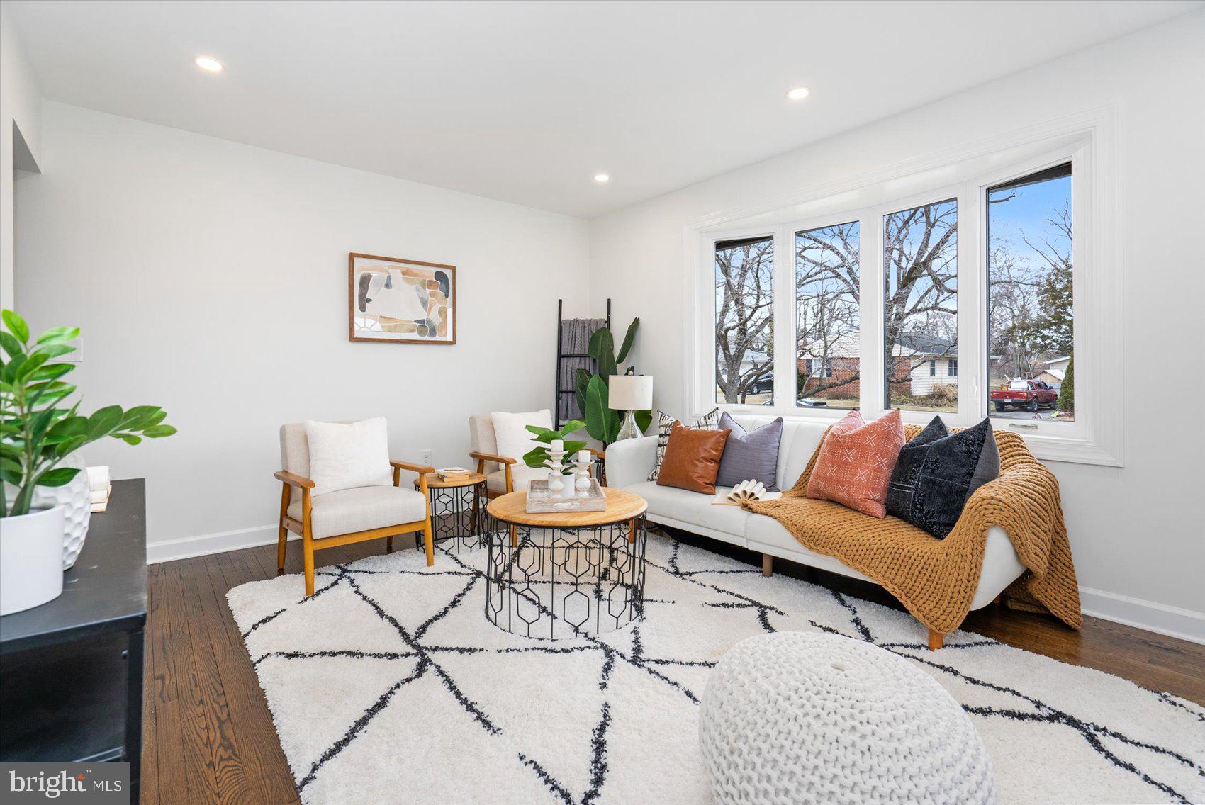 6809 Richardson Road Baltimore, MD 21207 - Photo 3 of 43 a living room with furniture and a large window