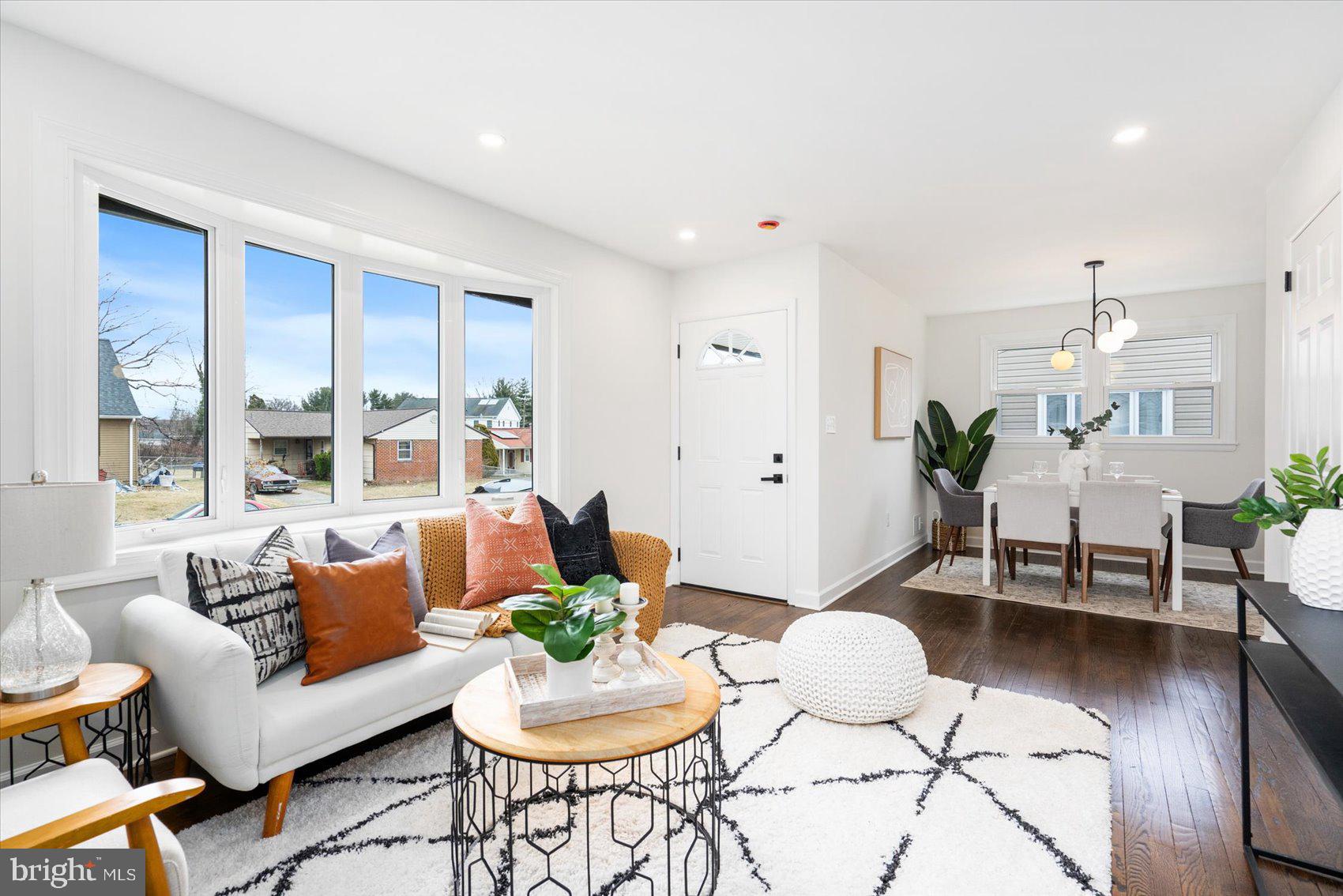 6809 Richardson Road Baltimore, MD 21207 - Photo 4 of 43 a living room with furniture and wooden floor