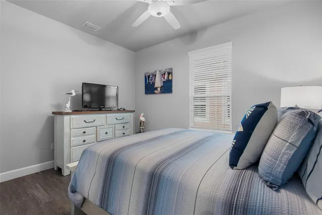 a view of a dining room with furniture wooden floor and front door